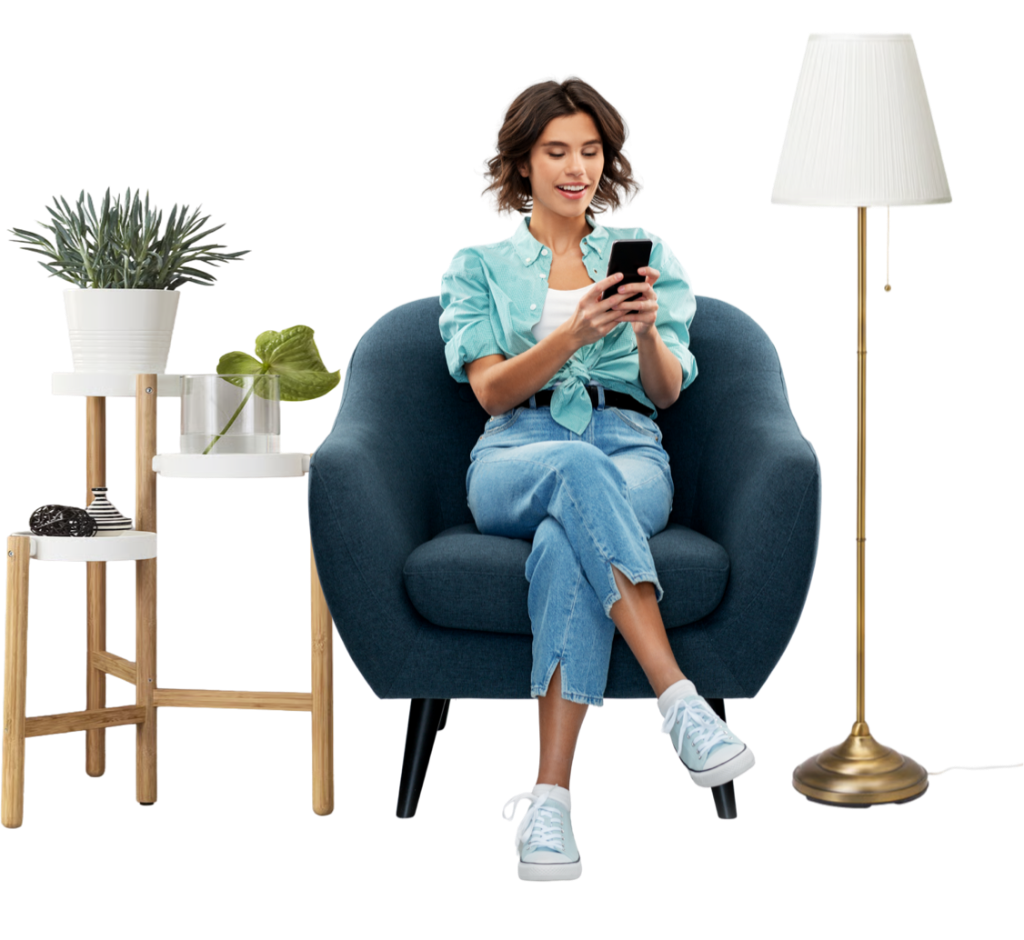 Woman relaxing at home browsing on smartphone with comfortable IKEA furniture
